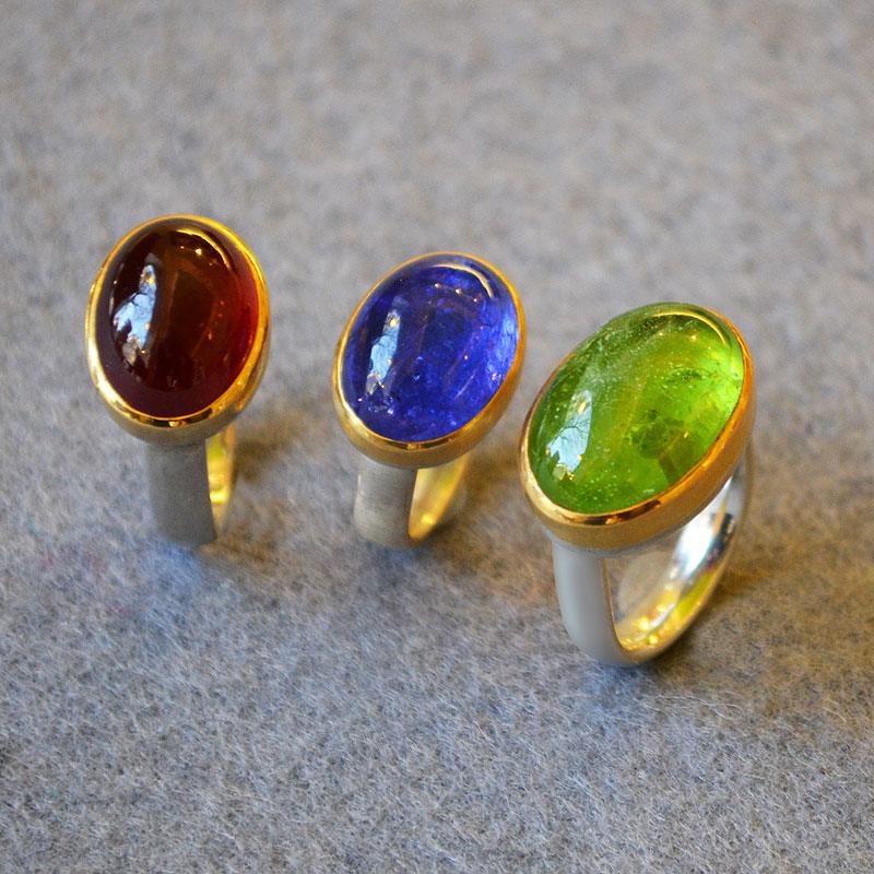 Ringe Silber 925, Fassung Gold 900, Cubochon oval, Granat, Tansanit, Peridot, Robert Lucha, Ihr Goldschmied in Nürnberg